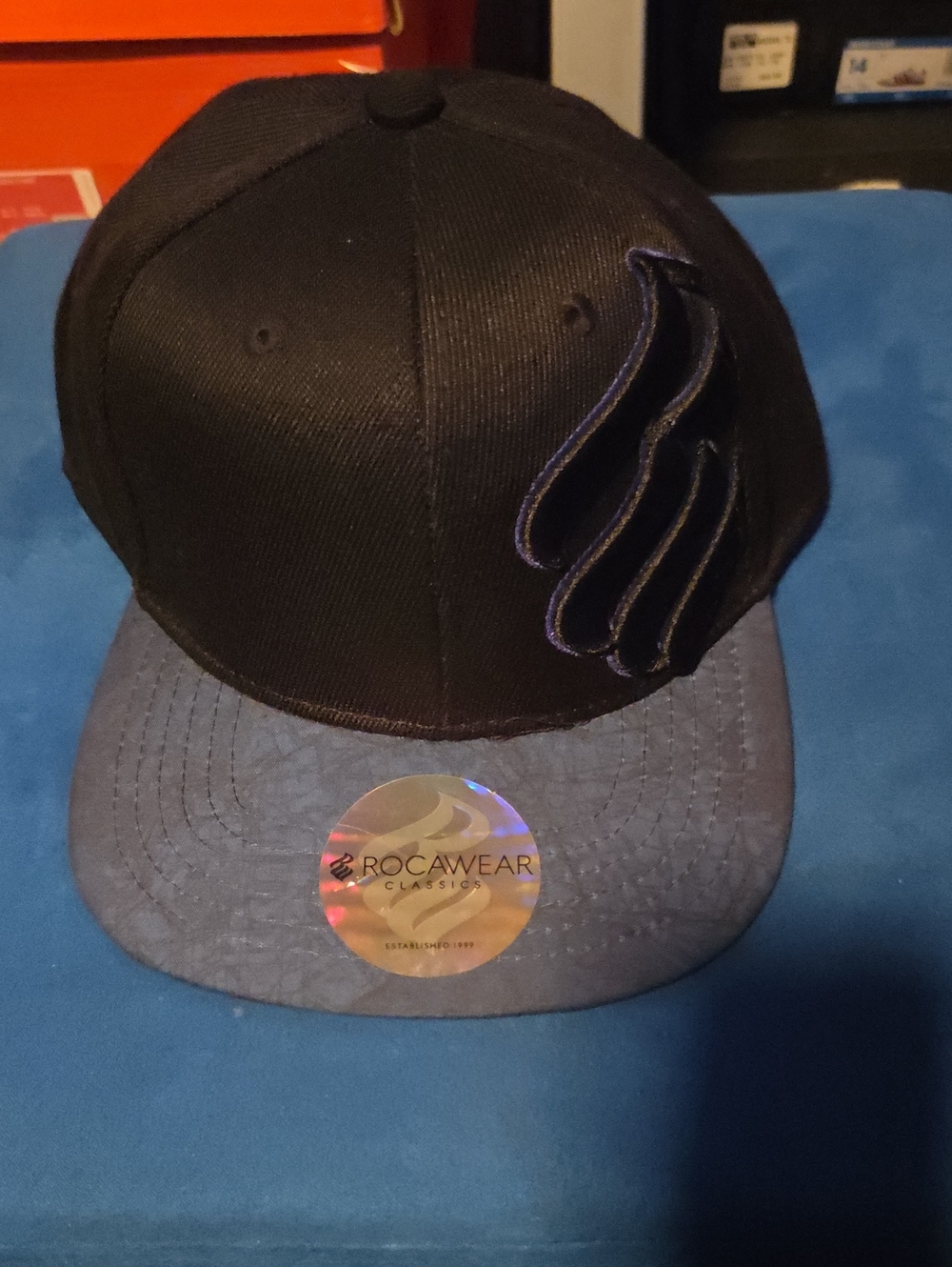 Rocawear Black Crown Logo Snapback with Blue Brim